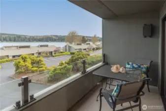 Deck  has glass partitions allowing one to sit outside for relaxation.