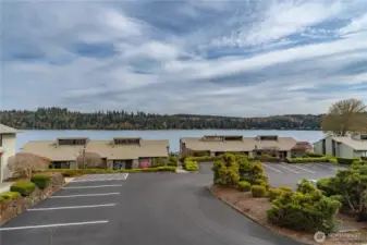 Parking lot for visitors and a second car. Carport is large and covered with a big storage room that can store extra items.