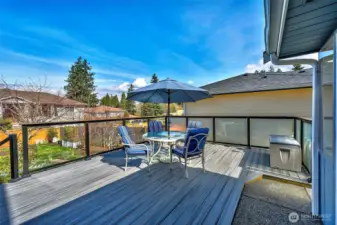 Relax and enjoy your gorgeous yard on your new Trex deck where there is always something new in bloom!