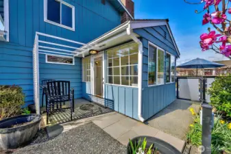 Bistro area outside of sunroom  perfect for morning coffee to catch a cool breeze on a hot day.