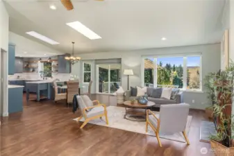 Great room with a mountain view and a propane fireplace.