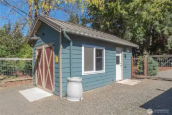 Shed for your yard tools and mower.