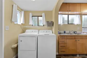 The convenient laundry area is right off the back entrance.