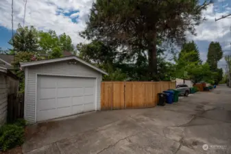 Garage parking in alley with access to fully fenced yard.