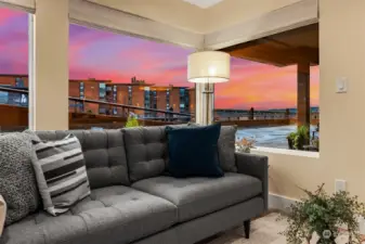 View at dusk to the North of Lake Washington from the Living Room. 520 Bridge in the distance. Enjoy waterfront living.