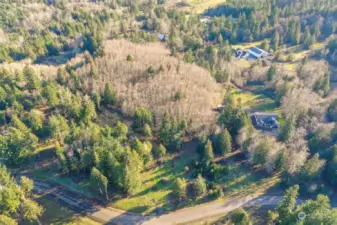 Easy access from Hewitt Road. Driveway was once graveled, but has since grown over.