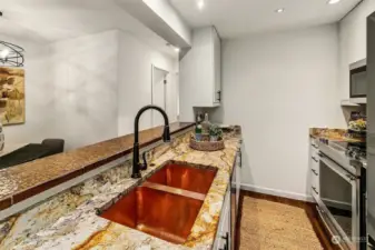 Kitchen is excellent, from the copper sink to the granite counters and newer cabinets and appliances; this is move-in ready.