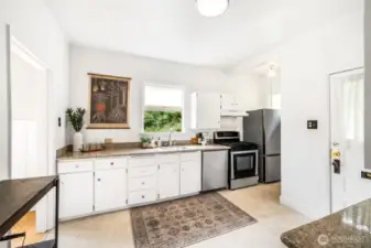 Updated countertops, fixtures, floors, and appliances...