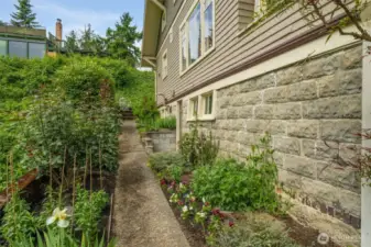 The southern side yard is a great place for herbs and edibles.
