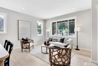 Entry, living & dining room.Previous built Peak house. Finishes may be different.