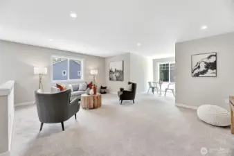 Upstairs bonus room. Previous built Peak house. Finishes may be different.