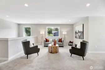 Upstairs bonus room. Previous built Peak house. Finishes may be different.
