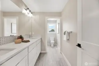 Upstairs main bathroom. Previous built Peak house. Finishes may be different.