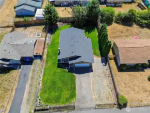 Aerial view of home with RV parking.