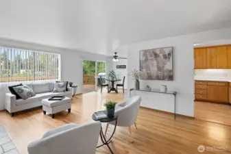 This cozy living room greets you as you come in, hardwood floors through out the upper level.