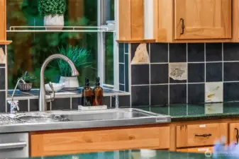 Design that blends beauty and functionality. Fossils highlight throughout the backsplash.