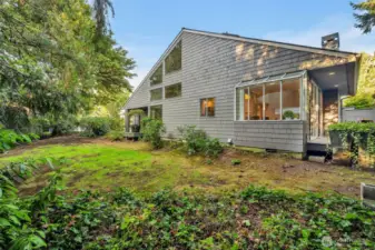 The bevy of windows thru-out the home capture natural light around the clock
