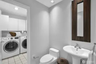 1/2 bath on the main leads to full size laundry room