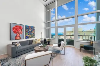 Breathtaking Views: Floor-to-ceiling windows frame sweeping vistas of Olympic Mountains, Puget Sound and spectacular sunsets