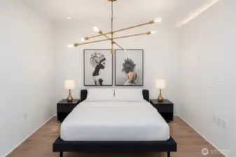 The seller currently uses the second bedroom as a dining room. To help your clients envision its potential, here is a virtual image showcasing the room with a queen bed and nightstands. You can find more information about it on the supplements.
