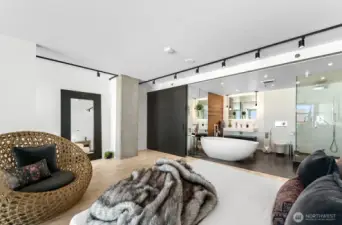 Upstairs, discover the expansive primary bedroom, complete with an ensuite bathroom and a walk-in closet, both offering sliding doors for enhanced privacy