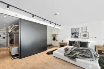 Upstairs, discover the expansive primary bedroom, complete with an ensuite bathroom and a walk-in closet, both offering sliding doors for enhanced privacy