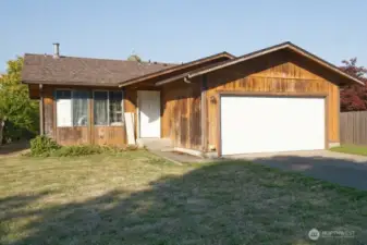Front of the home - 2 car garage and the home has a much needed new roof!