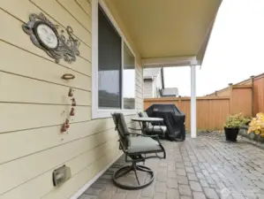 Covered back deck. Paved patio. Nice Raised Plant Area. Gas barbeque hookup.