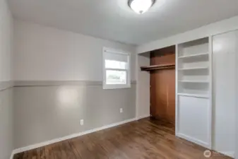 Bedroom 1 with built-in cabinets