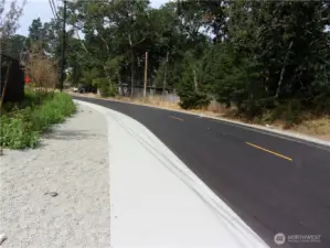 Looking west. Sidewalk runs along the south side of 146th Street and is across the street from the subject property.