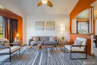 Large Formal Livingroom with dramatic Vaulted ceiling and big bay window