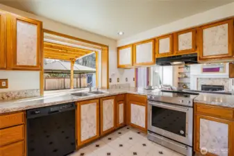 Plenty of counter space and an eat-in bar that opens to the greatroom.