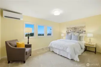 One of three upstairs bedrooms, with views of the sound and mountains.