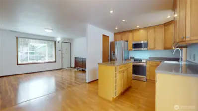 View from dining room looking to the kitchen and onto the living room