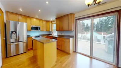 The slider allows for seemless indoor and outdoor entertaining on the expansive back deck.