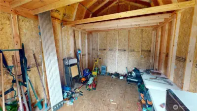 Inside the 12 x 14 barn with additional storage in the rafter areas.