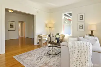 Charming living room with hardwood floors.
