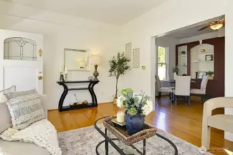 Charming living room with hardwood floors.