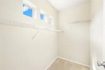 Walk in Closet with Windows for Primary Bedroom.