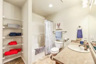 Large Full Bath with Laundry off of Upper Level Landing.