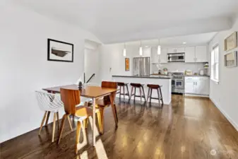 Great light on the main floor. Perched up above the street for privacy. Open concept kitchen, dining and living room.