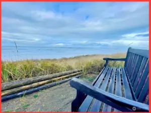 Imagine sitting on this bench at the end of your private beach path...