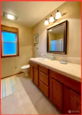 3/4 bathroom off of hallway on main level