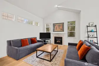 Open and bight living room with vaulted ceilings