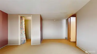 2nd floor bedroom with a half bath. Photo is  digitally altered.