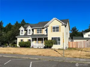 Large, level corner lot with fully fenced back yard.