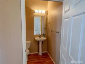 Conveniently located half bath off the front foyer.