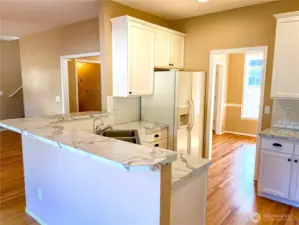 Eating bar adds to the fabulous functionality of the kitchen.