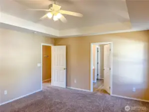 Primary bedroom boasts a 5 piece en suite bathroom and walk-in closet.