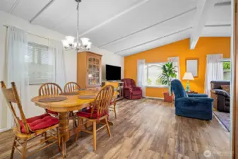 Dining room flows into living room.